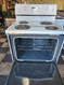 WHIRLPOOL 30 INCH FREESTANDING ELECTRIC RANGE COIL BURNERS 2 LARGE 2 SMALL SELF CLEAN OVEN CUSTOM BROIL OPTION WHITE LOCATED IN OUR PORTLAND OREGON APPLIANCE STORE SKU 23040