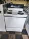 HOTPOINT 30 INCH FREESTANDING ELECTRIC RANGE MANUAL CLEAN OVEN COIL BURNERS 3 SMALL 1 LARGE WHITE LOCATED IN OUR PORTLAND OREGON APPLIANCE STORE SKU 23056