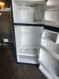 GE 18 CUBIC FOOT REFRIGERATOR TOP FREEZER WIRE SHELVES 2 CRISPER DRAWER FULL SIZE WIRE SHELF IN FREEZER BLACK LOCATED IN OUR PORTLAND OREGON APPLIANCE STORE SKU 23063