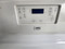 ESTATE BY WHIRLPOOL 30 INCH FREESTANDING ELECTRIC RANGE COIL BURNERS 2 LARGE 2 SMALL SELF CLEANING OVEN COSMETIC ISSUE TOP OF OVEN DOOR SEE PICS LOCATED IN OUR PORTLAND OREGON APPLIANCE STORE SKU 23067