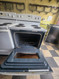 ESTATE BY WHIRLPOOL 30 INCH FREESTANDING ELECTRIC RANGE COIL BURNERS 2 LARGE 2 SMALL SELF CLEANING OVEN COSMETIC ISSUE TOP OF OVEN DOOR SEE PICS LOCATED IN OUR PORTLAND OREGON APPLIANCE STORE SKU 23067