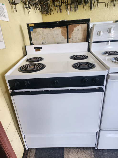 FRIGIDAIRE 30 INCH FREESTANDING WITH SMALL BACK PANEL ELECTRIC RANGE MANUAL CLEAN OVEN COIL BURNERS 3 SMALL 1 LARGE WHITE NO STORAGE DRAWER WHITE LOCATED IN OUR PORTLAND OREGON APPLIANCE STORE SKU 20068
