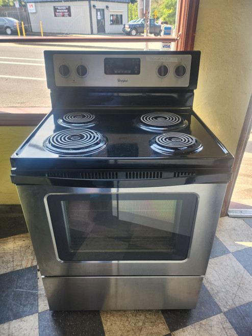 WHIRLPOOL 30 INCH FREESTANDING ELECTRIC RANGE COIL BURNERS 2 LARGE 2 SMALL SELF CLEANING OVEN BLACK AND STAINLESS LOCATED IN OUR PORTLAND OREGON APPLIANCE STORE SKU 23070