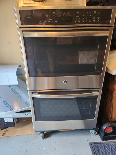 GE Profile 30 Inch Double Electric Wall Oven with True Convection, Steam Clean, Ten-Pass Bake Element, Heavy-Duty Roller Rack, Glass Touch Controls Stainless Steel COSMETIC ISSUE ON THE TOP OVEN FLOOR SEE PIC SKU 23079