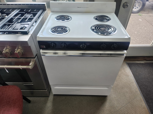 MAGIC CHEF 30 INCH FREESTANDING ELECTRIC RANGE COIL BURNERS 1 LARGE 3 SMALL MANUAL CLEAN OVEN WHITE LOCATED IN OUR PORTLAND OREGON APPLIANCE STORE SKU 23080
