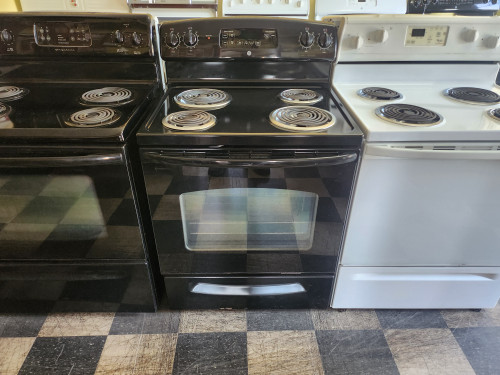 GE 30 INCH FREESTANDING ELECTRIC RANGE COIL BURNERS 2 LARGE 2 SMALL HI LO BROIL SETTING SELF CLEANING OVEN BLACK LOCATED IN OUR PORTLAND OREGON APPLIANCE STORE SKU 23082