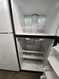 GE 18 CUBIC FOOT REFRIGERATOR GLASS SHELVES 2 CRISPER DRAWERS WIRE SHELF FREEZER 2 CRISPERS DRAWERS UP FRONT CONTROLS SILVER LOCATED IN OUR PORTLAND OREGON APPLIANCE STORE SKU 23094