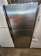 GE 18 CUBIC FOOT REFRIGERATOR GLASS SHELVES 2 CRISPER DRAWERS WIRE SHELF FREEZER 2 CRISPERS DRAWERS UP FRONT CONTROLS SILVER LOCATED IN OUR PORTLAND OREGON APPLIANCE STORE SKU 23094