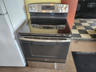 GE 30 INCH FREESTANDING GLASS TOP  5 BURNER ELECTRIC RANGE SELF CLEANING OVEN HI-LO BROIL OPTION STAINLESS LOCATED IN OUR PORTLAND OREGON APPLIANCE STORE SKU 23100