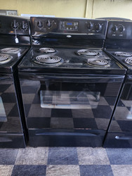 WHIRLPOOL 30 INCH ELECTRIC FREESTANDING RANGE COIL BURNERS 2 LARGE 2 SMALL MANUAL CLEAN OVEN STORAGE DRAWER BLACK LOCATED IN OUR POTLAND OREGON APPLIANCE STORE SKU 23103