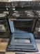 WHIRLPOOL 30 INCH ELECTRIC FREESTANDING RANGE COIL BURNERS 2 LARGE 2 SMALL MANUAL CLEAN OVEN STORAGE DRAWER BLACK LOCATED IN OUR POTLAND OREGON APPLIANCE STORE SKU 23103
