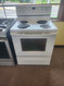 WHIRLPOOL 30 INCH FREESTANDING ELECTRIC RANGE COIL BURNERS 2 LARGE 2 SMALL SELF CLEANING OVEN STORAGE DRAWER WHITE LOCATED IN OUR PORTLAND OREGON APPLIANCE STORE SKU 23117