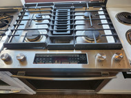 Jenn-Air Euro-Style Series 30 Inch Slide-In Dual Fuel Range with 4 Sealed Burners, 6.4 Cu. Ft. Capacity, Continuous Grates, Self-Clean, Downdraft Ventilation, True Convection 17000 BTU Burner COSMETIC ISSUE TOP OF OVEN DOOR STAINLESS SKU 23120
