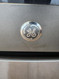 GE 30 INCH FREESTANDING 5 BURNER GLASS TOP RANGE 2 DUAL 2 SMALL 1 WARMING HI-LO BROIL OPTION SELF CLEANING OVEN STAINLESS AND BLACK LOCATED IN OUR PORTLAND OREGON APPLIANCE STORE SKU 23121
