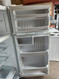 GE 17 CUBIC FOOT REFRIGERATOR TOP FREEZER FULL WIDTH GLASS SHELVES 2 CRISPER DRAWERS WIRE SHELF IN FREEZER WHITE LOCATED IN OUR PORTLAND OREGON APPLIANCE STORE SKU 23135