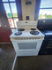 GE 30 INCH FREESTANDING ELECTRIC RANGE COIL BURNERS 2 LARGE 2 SMALL SELF CLEANING OVEN HI-LO BROIL OPTION STORAGE DRAWER WHITE LOCATED IN OUR PORTLAND OREGON APPLIANCE STORE SKU 23141