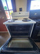 GE 30 INCH FREESTANDING ELECTRIC RANGE COIL BURNERS 2 LARGE 2 SMALL SELF CLEANING OVEN HI-LO BROIL OPTION STORAGE DRAWER WHITE LOCATED IN OUR PORTLAND OREGON APPLIANCE STORE SKU 23141