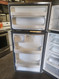 GE 18 CUBIC FOOT REFRIGERATOR TOP FREEZER FULL WIDTH GLASS SHELVES 2 CRISPER DRAWERS 1 MEAT / DELI PAN FULL WIDTH WIRE SHELF IN FREEZER COSMETIC ISSUES ON DOORS LOTS OF SCRATCHES STAINLESS LPOCATED IN OUR POTLAND OREGON APPLIANCE STORE SKU 23142