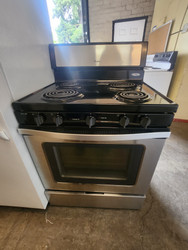 WHIRLPOOL 30 INCH FREESTANDING ELECTRIC RANGE COIL BURNERS 2 LARGE 2 SMALL SELF CLEANING OVEN BLACK AND STAINLESS LOCATED IN OUR PORTLAND OREGON APPLIANCE STORE SKU 23149