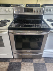 FRIGIDAIRE GALLERY 30 INCH FREESTANDING 5 BURNER GLASS TOP ELECTRIC RANGE QUICK PREHEAT CONVECTION SELF CLEANING OVEN BLACK AND STAINLESS LOCATED IN OUR PORTLAND OREGON APPLIANCE STORE SKU 23155