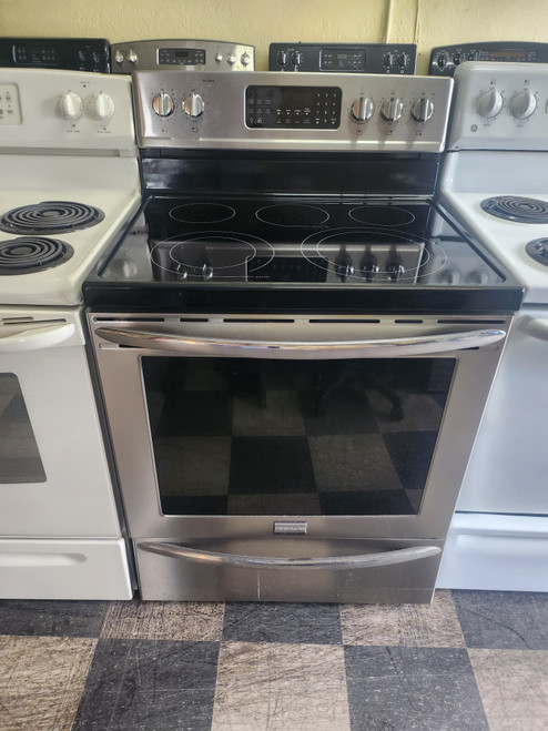 FRIGIDAIRE GALLERY 30 INCH FREESTANDING 5 BURNER GLASS TOP ELECTRIC RANGE QUICK PREHEAT CONVECTION SELF CLEANING OVEN BLACK AND STAINLESS LOCATED IN OUR PORTLAND OREGON APPLIANCE STORE SKU 23155