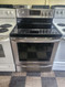 FRIGIDAIRE GALLERY 30 INCH FREESTANDING 5 BURNER GLASS TOP ELECTRIC RANGE QUICK PREHEAT CONVECTION SELF CLEANING OVEN BLACK AND STAINLESS LOCATED IN OUR PORTLAND OREGON APPLIANCE STORE SKU 23155