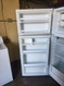 WHIRLPOOL 16 CUBIC FOOT REFRIGERATOR WITH ICE MAKER ADJUSTABLE WIRE SHELVES  1 LARGE CRISPER DRAWER WITH GLASS COVER WHITE LOCATED IN OUR PORTLAND OREGON APPLIANCE STORE SKU 23157