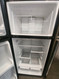 GE 16 CUBIC FOOT RERRIGERATOR GLASS SHELVES WITH 1 DELI PAN AND 2 CRISPER DRAWERS WIRE SHELF IN FREEZER BLACK LOCATED IN OUR PORTLAND OREGON APPLIANCE STORE SKU 23167