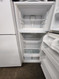 WHIRLPOOL 16 CUBIC FOOT REFRIGERATOR WIRE SHELVES 2 CRISPER DRAWERS GLASS COVER WIRE SHELF IN FREEZER WHITE LOCATED IN OUR PORTLAND OREGON APPLIANCE STORE SKU 23169