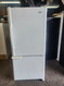 AMANA 19 CUBIC FOOT BOTTOM FREEZER GLASS SHELVES SWING OPEN FREEZER DOOR 1 WIRE SHELF AND PULL BASKET IN FREEZER WHITE LOCATED IN OUR PORTLAND OREGON APPLIANCE STORE SKU 23173