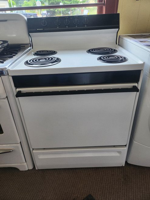 FRIGIDAIRE ELECTRIC RANGE COIL BURNERS 2 LARGE 2 SMALL MANUAL CLEAN OVEN WHITE LOCATED IN OURN PORTLAND OREGON APPLIANCE STORE SKU 23183