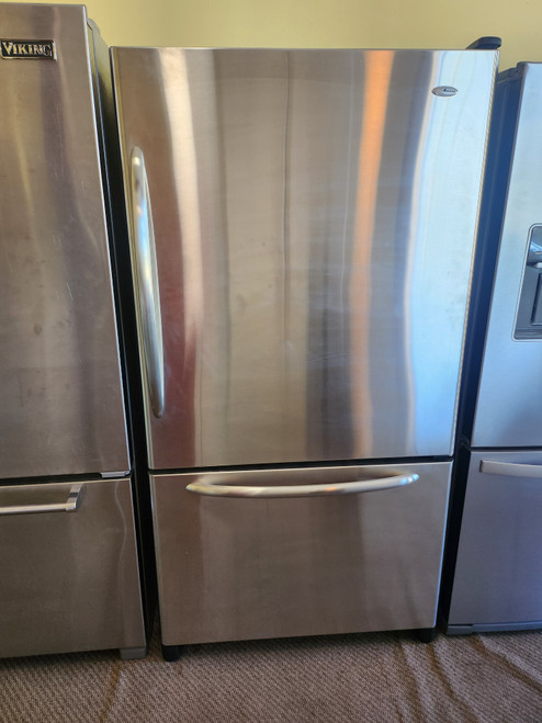 Amana 25.1 Cu. Ft. Easy Reach? Slide-Out Bottom Freezer Refrigerator w/ Built in Ice Maker: Stainless Steel w/ Black Cabinet: Right Hinge LOCATED IN OUR PORTLAND OREGON APPLIANCE STORE SKU 23200