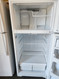HOTPOINT 16 CUBIC FOOT TOP FREEZER ADJUSTABLE WIRE SHELVES 2 CRISPER DRAWERS WIRE SHELF IN FREEZER WHITE LOCATED IN OUR PORTLAND OREGON APPLIANCE STORE SKU 23202