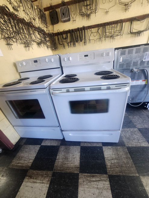 FRIGIDAIRE 30 INCH FREESTANDING ELECTRIC RANGE COIL BURNERS 2 LARGE 2 SMALL SELF CLEANING OVEN STORAGE DRAWER WHITE LOCATED IN OUR PORTLAND OREGON APPLIANCE STORE SKU 23210