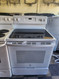 GE 30 INCH FREESTANDING GLASS TOP RANGE 4 BURNER 2 LARGE DUAL 2 SMALL HI/LO BROIL OPTION SELF CLEANING OVEN WHITE LOCATED IN OUR PORTLAND OREGON APPLIANCE STORE SKU 23216