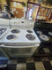 GE 30 INCH FREESTANDING ELECTRIC RANGE COIL BURNERS 2 LARGE 2 SMALL HI/LO BROILSETTING SELF CLEANING OVEN WHITE LOCATED IN OUR PORTLAND OREGON APPLIANCE STORE SKU 23223