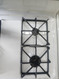 GE 30 INCH FREESTANDING 4 BURNER GAS RANGE 1 LARGE 2 MEDIUM 1 SMALL HI/LO BROIL OPTION MANUAL CLEAN OVEN WHITE LOCATED IN OUR PORTLAND OREGON APPLIANCE STORE SKU 23227