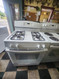 GE 30 INCH FREESTANDING 4 BURNER GAS RANGE 1 LARGE 2 MEDIUM 1 SMALL HI/LO BROIL OPTION MANUAL CLEAN OVEN WHITE LOCATED IN OUR PORTLAND OREGON APPLIANCE STORE SKU 23227