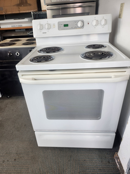 KENMORE 30 INCH FREESTANDING ELECTRIC RANGE COIL BURNERS 2 LARGE 2 SMALL SELF CLEANING OVEN WHITE LOCATED IN OUR PORTLAND OREGON APPLIANCE STORE SKU 23228