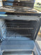 WHIRLPOOL 30 INCH FREESTANDING ELECTRIC RANGE COIL BURNERS 2 LARGE 2 SMALL MANUAL CLEAN OVEN BLACK LOCATED IN OUR PORTLAND OREGON APPLIANCE STORE SKU 23232
