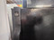 GE 17 CUBIC FOOT REFRIGERATOR TOP FREEZER ADJUSTABLE WIRE SHELVES 2 CRISPER DRAWERS FULL WIDTH SHELF IN FREEZER BLACK LOCATED IN OUR PORTLAND OREGON APPLIANCE STORE SKU 23242
