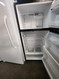 GE 17 CUBIC FOOT REFRIGERATOR TOP FREEZER ADJUSTABLE WIRE SHELVES 2 CRISPER DRAWERS FULL WIDTH SHELF IN FREEZER BLACK LOCATED IN OUR PORTLAND OREGON APPLIANCE STORE SKU 23242