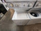 WHIRLPOOL THIN TWIN 24 INCH LAYNDRY CENTER WASHER 8 CYCLE 4 LOAD SIZE SETTING 4 TEMPRATURE DRYER 4 CYCLE 2 AUTO DRY 1 HIGH HEAT 1 LOW HEAT TIMED DRY HIGH HEAT PLUS AIR DRY WHITE LOCATED IN OUR PORTLAND OREGON APPLIANCE STORE SKU 23245