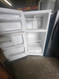 HOTPOINT 14 CUBIC FOOT REFRIGERATOR TOP FREEZER WIRE SHELVES 2 CRISPER DRAWERS COSMETIC ISSUES ON TOP OF REFRIGERATOR DOOR WHITE LOCATED IN OUR PORTLAND OREGON APPLIANCE STORE SKU 23256