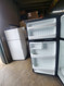 GE 17 CUBIC FOOT REFRIGERATOR TOP MFREEZER 2 FULL WIDTH ADJUSTABLE SHELVES 1 GLASS 1 WIRE 2 CRISPER DRAWERS BLACK  LOCATED IN OUR PORTLAND OREGON APPLIANCE STORE SKU 23260