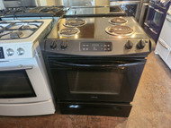 FRIGIDAIRE 30 INCH SLIDE-IN ELECTRIC RANGE COIL BURNERS  2 LARGE 2 SMALL SELF CLEAN OVEN BLACK LOCATED IN OUR PORTLAND OREGON APPLIANCE STORE SKU 23265