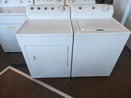 FRIGIDAIRE TOP LOAD WASHER AND DRYER SET WASHER 12 CYCLE SUPER CAPACITY WITH 2 SPEED MOTOR DRYER 4 TEMPERATURE HEAVY WHITE LOCATED IN OUR PORTLAND OREGON APPLIANCE STORE SKU 23272