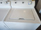 FRIGIDAIRE TOP LOAD WASHER AND DRYER SET WASHER 12 CYCLE SUPER CAPACITY WITH 2 SPEED MOTOR DRYER 4 TEMPERATURE HEAVY WHITE LOCATED IN OUR PORTLAND OREGON APPLIANCE STORE SKU 23272