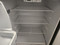 GE 17 CUBIC FOOT REFRIGERATOR WITH ADJUSTABLE WIRE SHELVES 2 CRISPER DRAWERS FILL WIDTH WIRE SHELF IN FREEZER BLACK LOCATED IN OUR PORTLAND OREGON APPLIANCE STORE SKU 23277