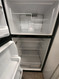 GE 17 CUBIC FOOT REFRIGERATOR WITH ADJUSTABLE WIRE SHELVES 2 CRISPER DRAWERS FILL WIDTH WIRE SHELF IN FREEZER BLACK LOCATED IN OUR PORTLAND OREGON APPLIANCE STORE SKU 23277